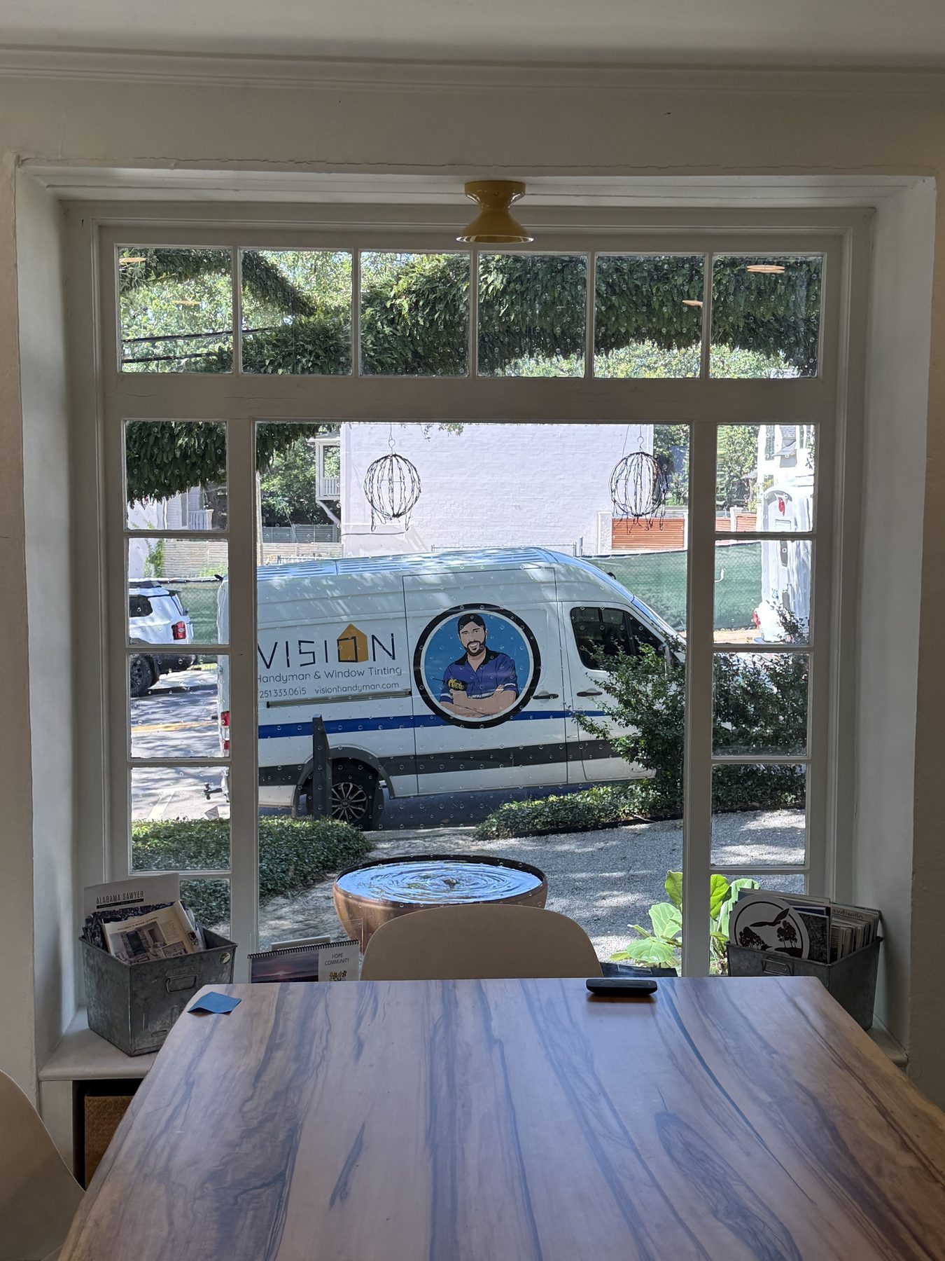 Looking out through bird diversion markers at the Vision van
