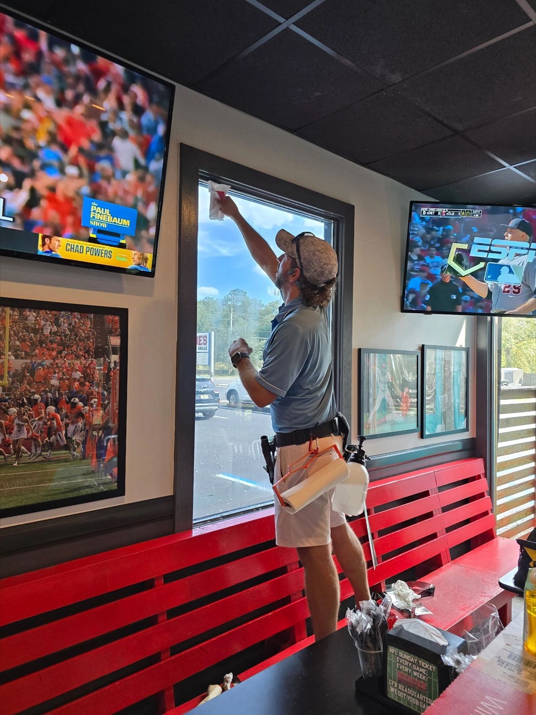 Window film going up in a restaurant dining room in Mobile